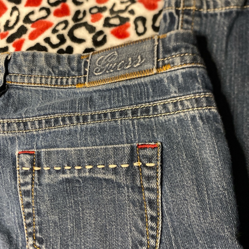 Vintage Guess low rise skinny jeans with red and white stitching
